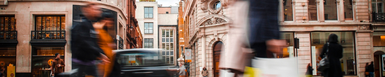 People walking along a street in London