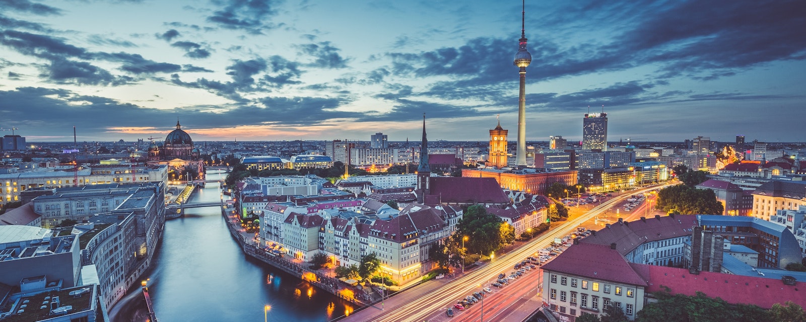 Aerial,View,Of,Berlin,Skyline,With,Dramatic,Clouds,In,Twilight