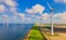 Windmill,Turbines,At,Sea,Generate,Green,Energy,In,The,Netherlands.