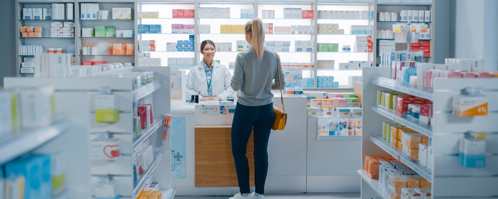 Pharmacy,Drugstore:,Beautiful,Young,Woman,Buying,Medicine,,Drugs,,Vitamins,Stands